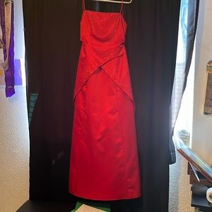 Vintage satin red dress.  Backless with adjustable straps.  Size 7/8.